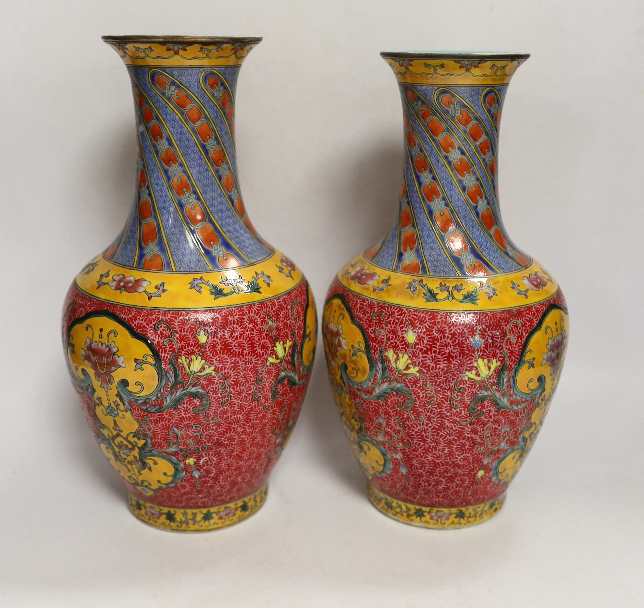 A boxed pair of Chinese famille rose baluster vases, 29cm